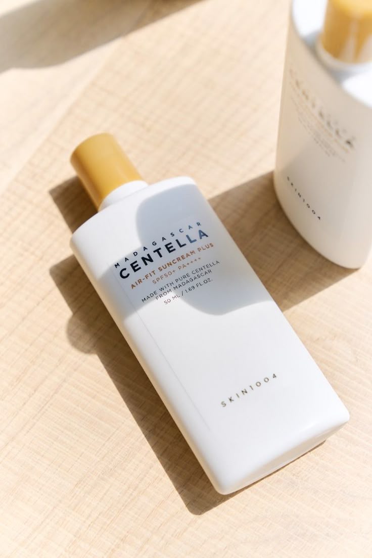 Skintouch Centella Asiatica skincare bottle on a beige surface