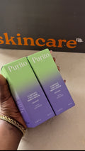 Two Purito skincare products held by a hand with a visible brand logo in the background.